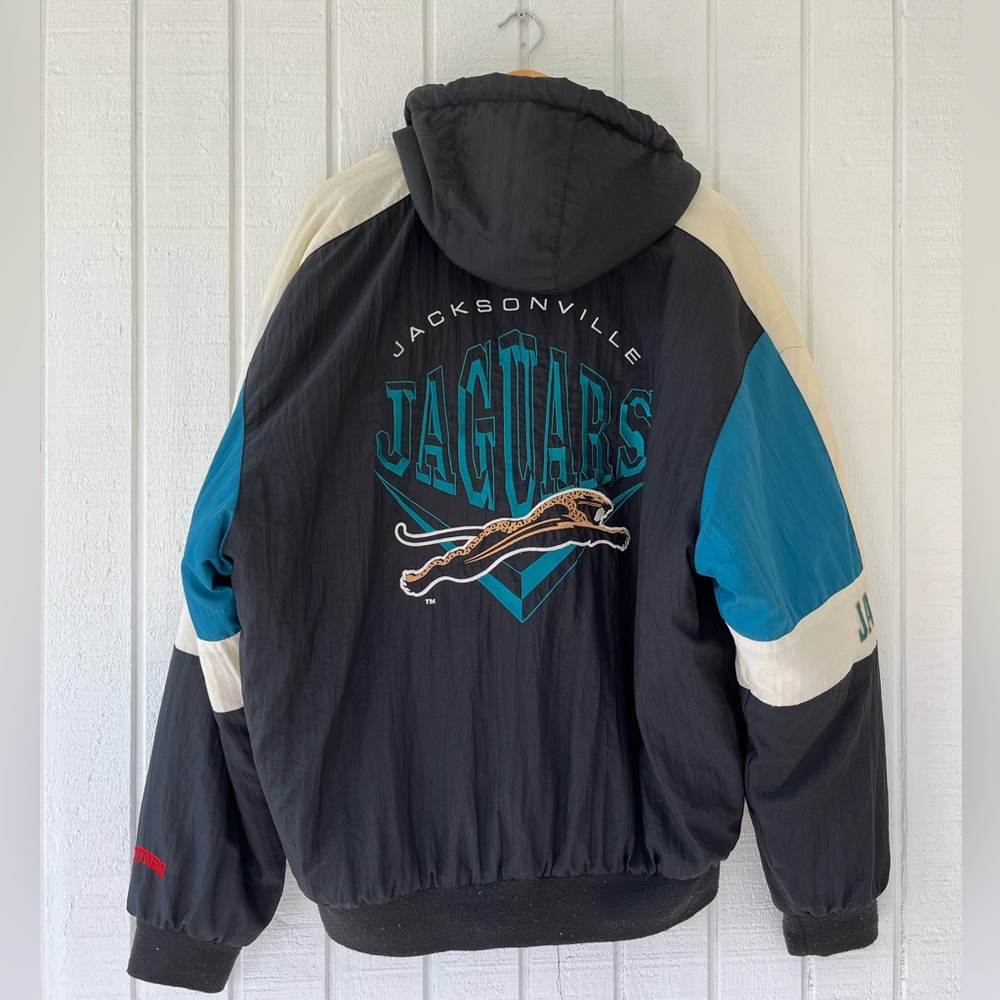 Vintage Nutmeg Banned Logo Jacksonville Jaguars Puffer Jacket
